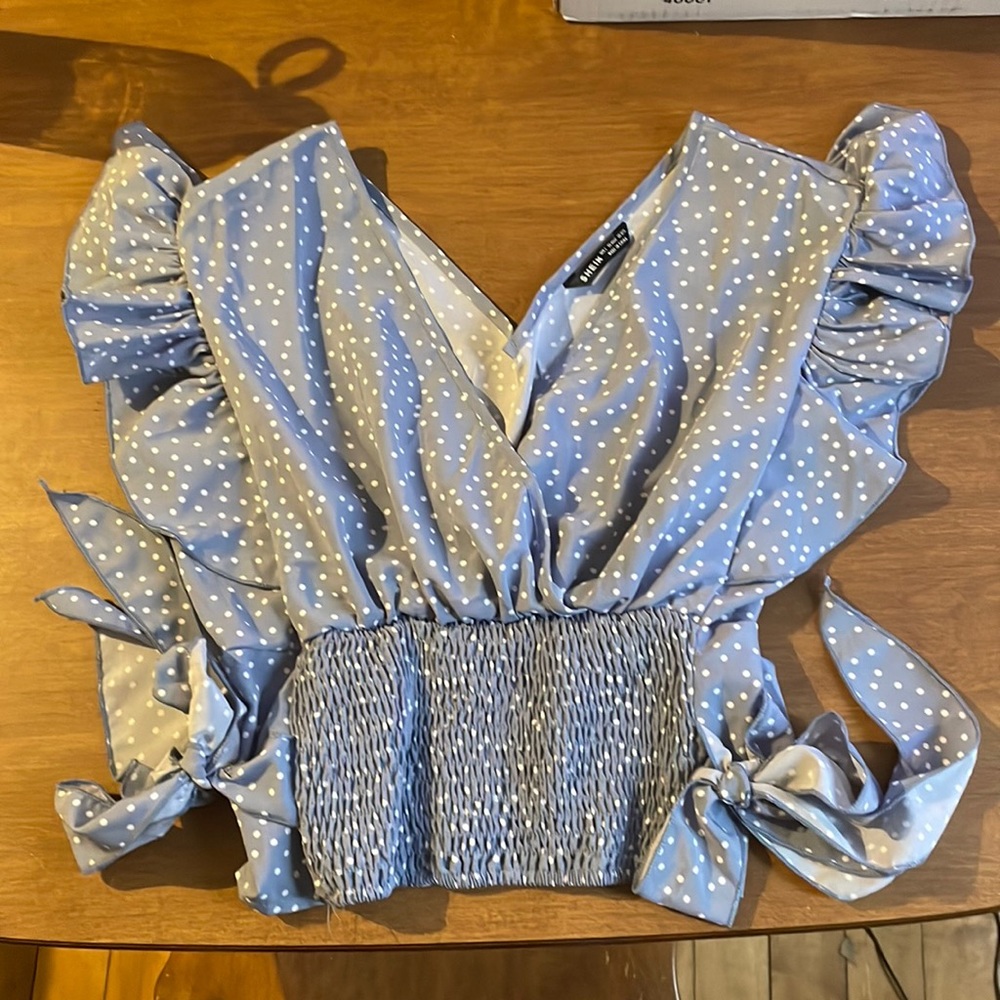 Beautiful blue top, runs small and did not fit me from SHEIN